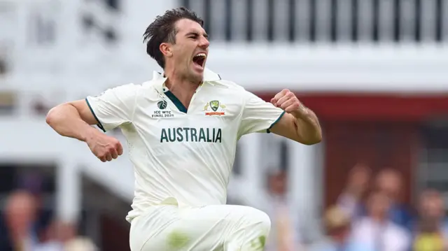 Pat Cummins celebrates taking wicket
