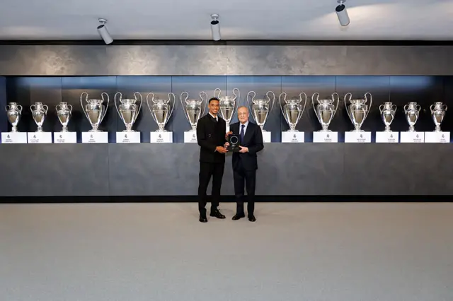 Trent Alexander-Arnold poses with president of Real Madrid Florentino Pérez