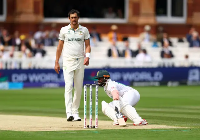 Mitchell Starc and Temba Bavuma