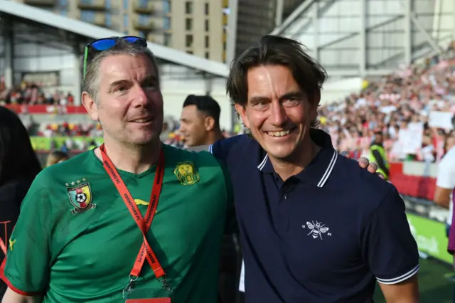 Matthew Benham, Owner of Brentford, interacts with Thomas Frank,