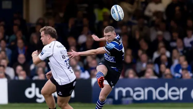 Finn Russell kicks ahead