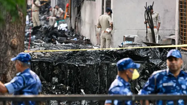 Plane debris at the site of Air India plane crash in Ahmedabad, India