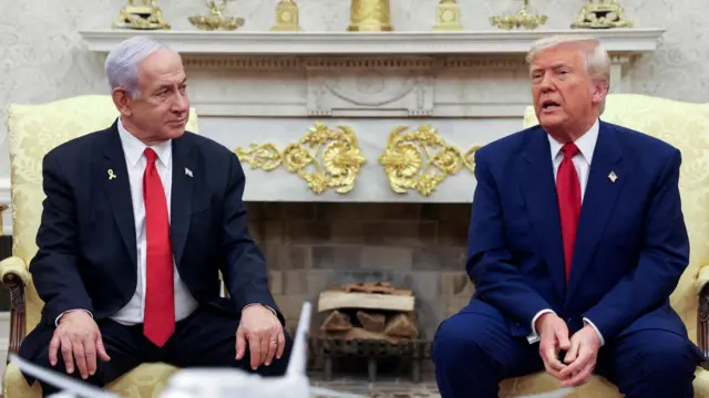President Trump talks to Israeli Prime Minister Benjamin Netanyahu during a meeting at the White House where Trump announced nuclear talks with Iran.