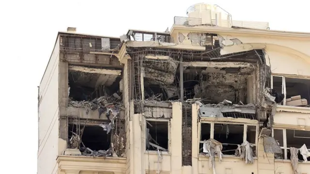 This picture shows a building damaged in an Israeli strike on Tehran on June 13, 2025.