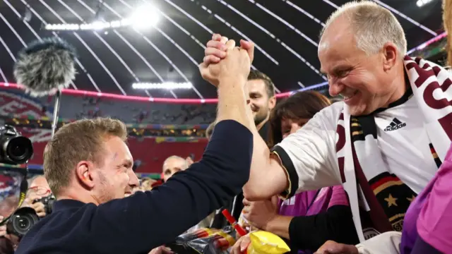 Julian Nagelsmann Head coach of Germany celebrate with Hans Wirtz father of Florian Wirtz of Germany