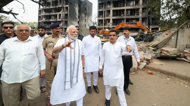 Indian Prime Minister Narendra Modi visits the crash site after UK-bound Air India passenger plane with 242 people on board