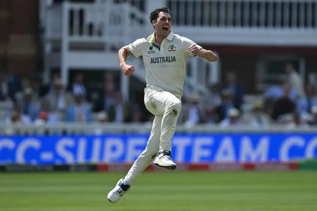 Australia's Pat Cummins celebrates a wicket v South Africa