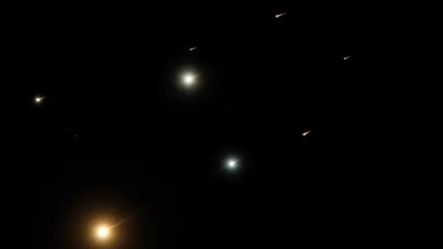 Missiles launched from Iran towards Israel are seen from Tubas