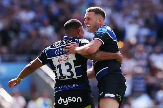 Finn Russell celebrates with Max Ojomoh
