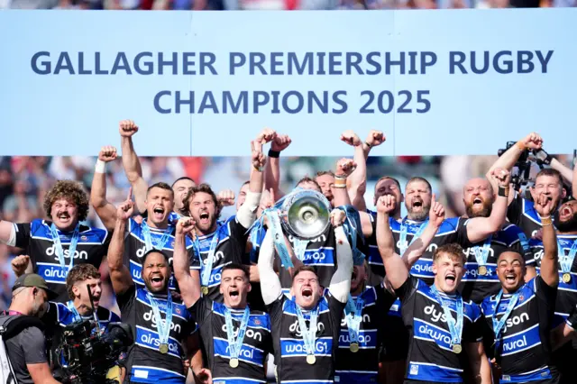 Bath captain Ben Spencer collects the Premiership trophy