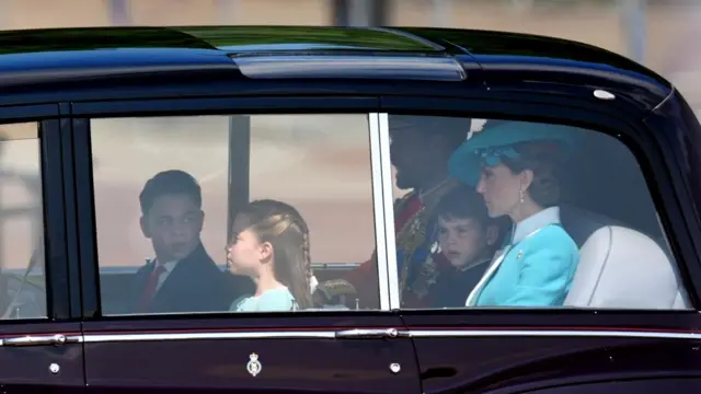 Prince George, Princess Charlotte, the Prince of Wales, Prince Louis and the Princess of Wales arrive at Buckingham Palace ahead of Trooping the Colour ceremony in central London as King Charles III celebrates his official birthday