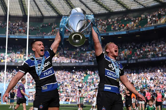 Cameron Redpath (l) of Bath Rugby and team mate Miles Reid celebrate with the trophy after winning the Gallagher Premiership Rugby Final match between Bath Rugby and Leicester Tigers