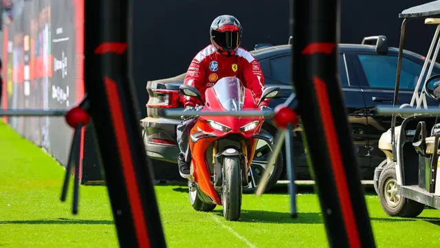 Lewis Hamilton arriving at the Canadian Grand Prix on a motorbike