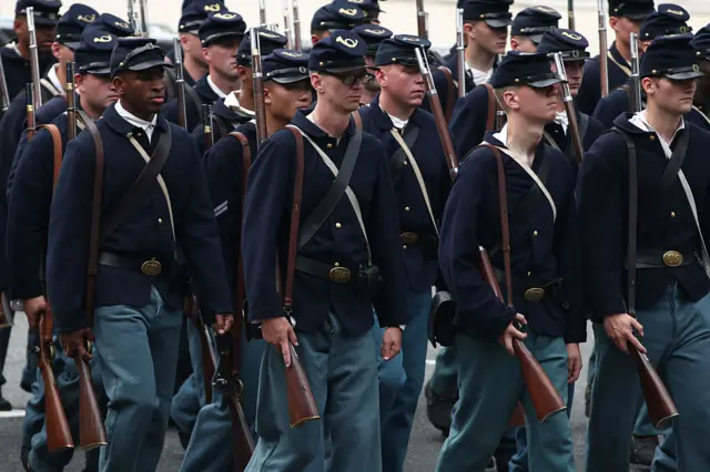 US soldiers dressed in Union uniforms march in Washington