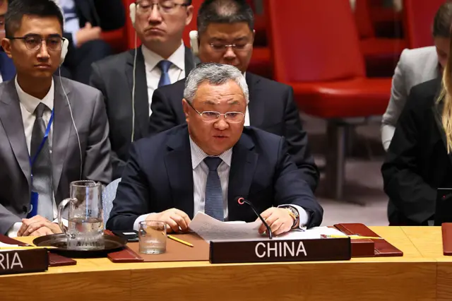 Fu Cong, China's permanent representative to the UN, sits behind a table at a UN Security Council meeting on