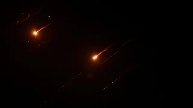 Missiles launched from Iran towards Israel are seen from Tubas, in the Israeli-occupied West Bank