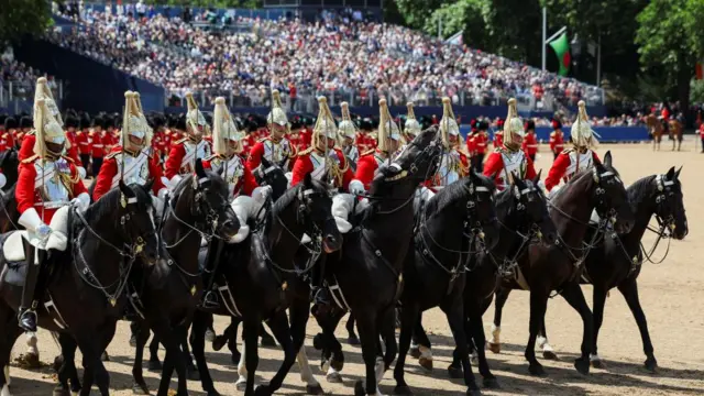 Members of the Household Cavalry take part in the Trooping the Colour parade which honours Britain's King Charles on his official birthday