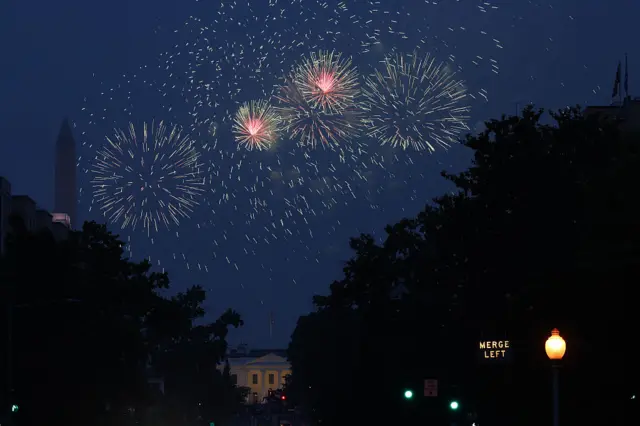 Fireworks erupt over the White House and Washington Monument