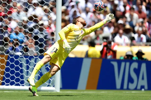 Oblak saves a shot onto the crossbar