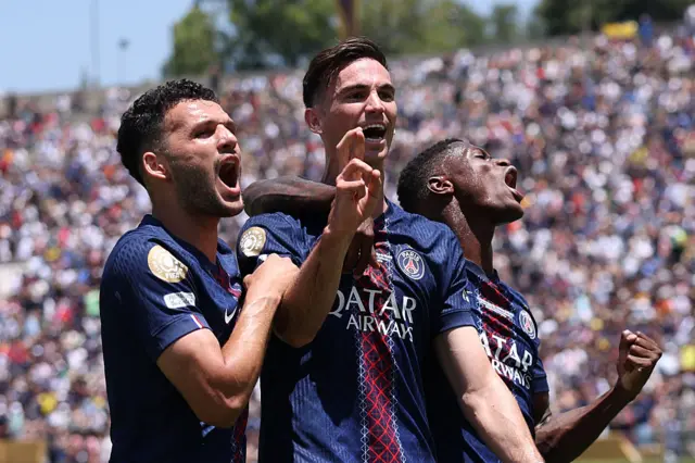 PSG players celebrate with Ruiz after he opened the scoring