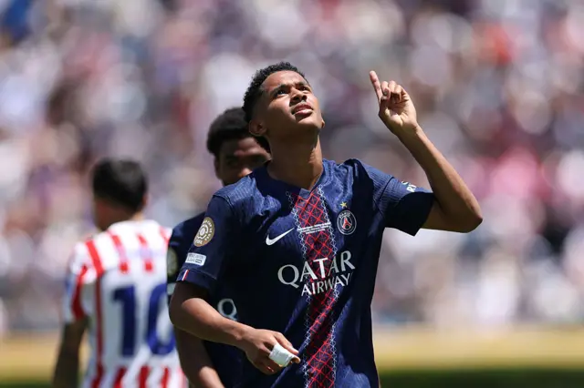 Mayulu celebrates his goal by pointing to the sky