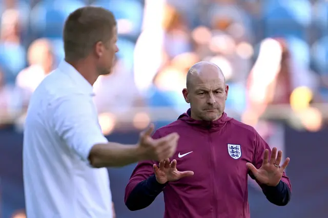 Carsley gives his side a palms down to urge calm
