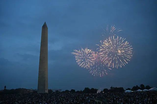 Fireworks are set off at the Tidal Basin near the Washington Monument