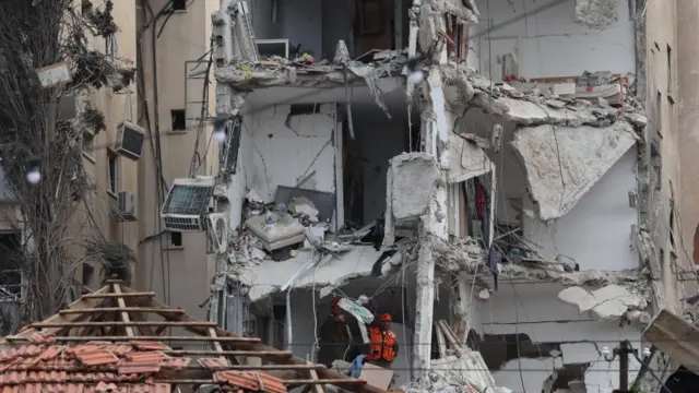 The site of a damaged residential area after Iranian ballistic missiles hit Rehovot, central Israel.