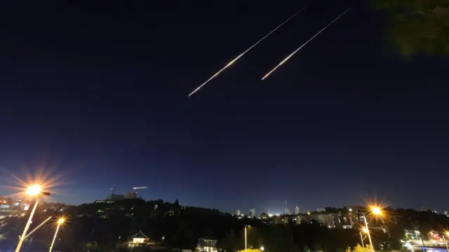Light trails as missiles fired from Iran fliy over Jerusalem