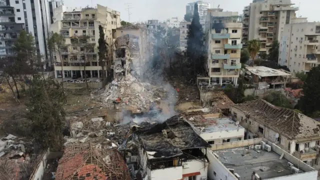The site of a damaged residential area after Iranian ballistic missiles hit Rehovot, central Israel.