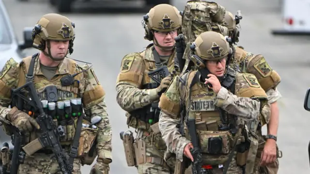 Law enforcement gather in Green Isle, Minnesota