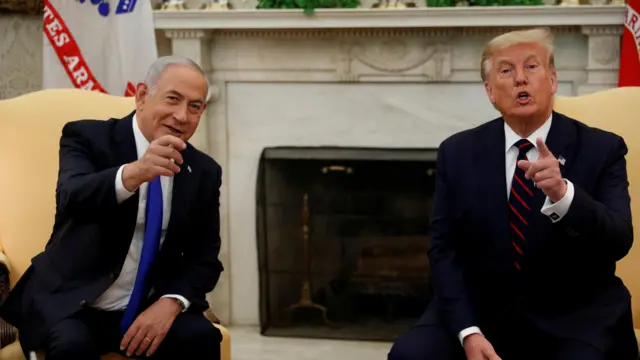 Israeli Prime Minister Benjamin Netanyahu gestures alongside US President Donald Trump during a visit to the White House on 15 September 2020