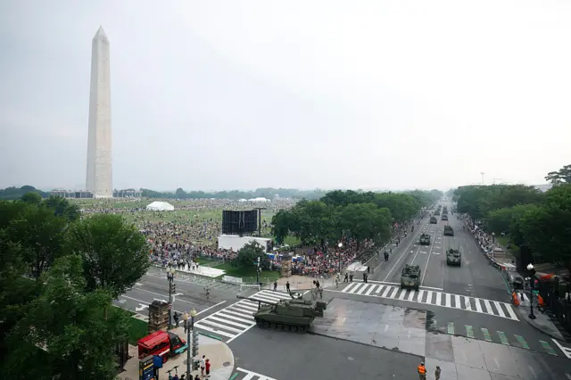 Spectators gather on the National Mall to watch the military parade