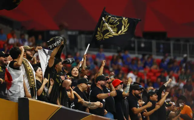LAFC fans cheer their team in the stands