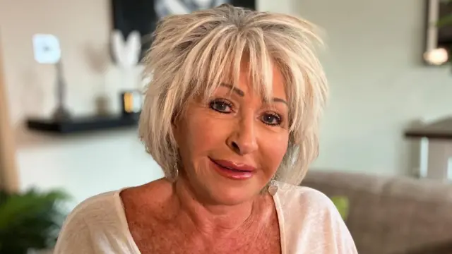 Maggie Oliver in a living room