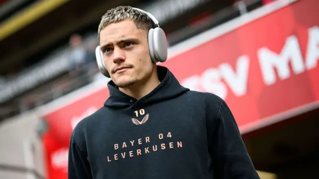 Florian Wirtz of Leverkusen looks on prior to the Bundesliga match