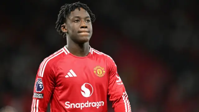 Kobbie Mainoo of Manchester United looks on