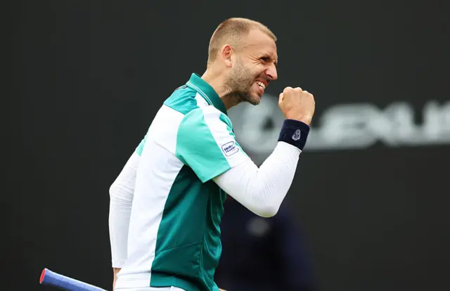 Dan Evans holds up his fist