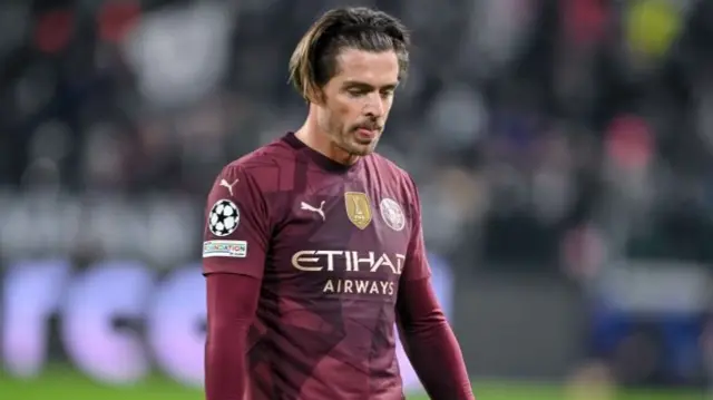 Jack Grealish of Manchester City looks dejected