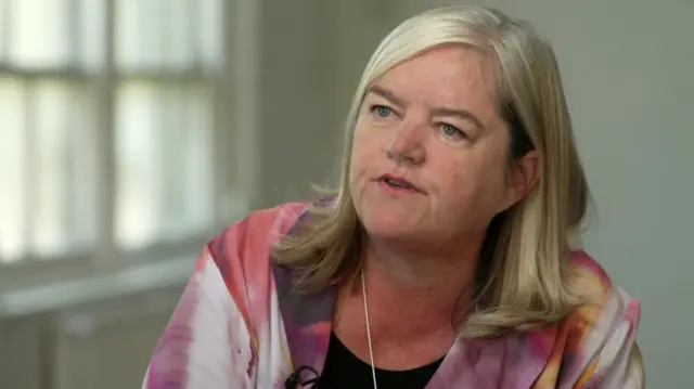Louise Casey, wearing a pink shirt, speaks to the BBC in 2023