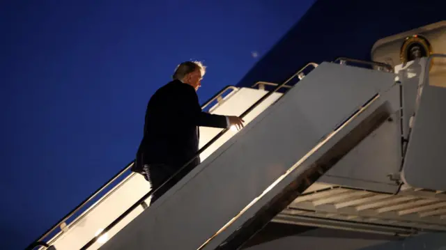 US President Donald Trump boarding Air Force One in Calgary, Canada.