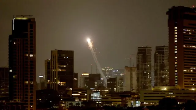 The Iron Dome, the Israeli air defense system, intercepts missiles fired from Iran, over Tel Aviv, Israel