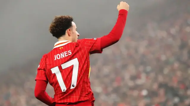 Curtis Jones of Liverpool celebrates scoring