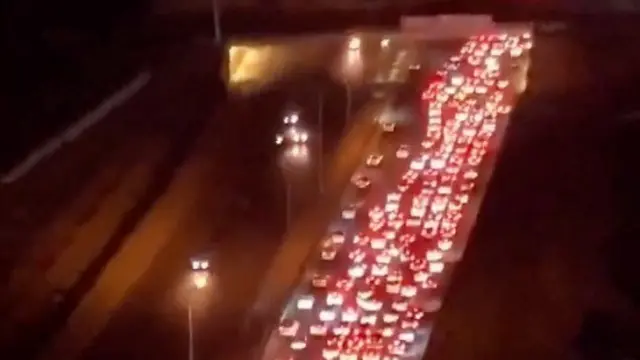 Heavy traffic on the Karaj-Chalus road as vehicles move westwards in a direction leading out of Tehran, Iran, as Israel and Iran continue to attack each other, in this screen grab obtained from social media video released June 16, 2025