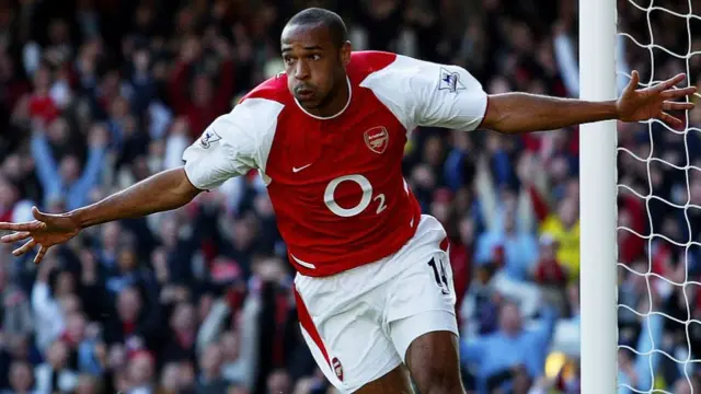 Thierry Henry of Arsenal celebrates scoring