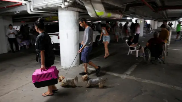 People take shelter amid missile attacks from Iran, in Tel Aviv, Israel,
