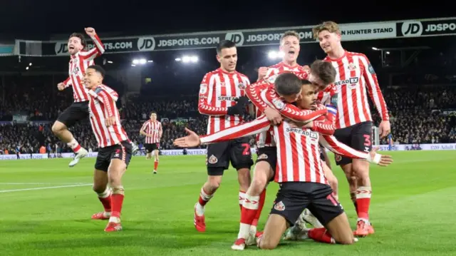 Wilson Isidor of Sunderland scores the opening goal and celebrates