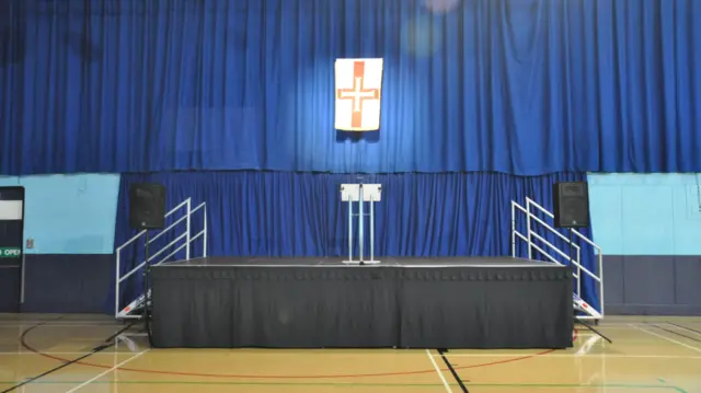 Lectern with Guernsey flag behind