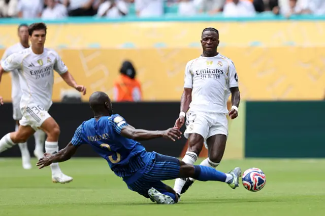 Vinicius Junior #7 of Real Madrid C. F. is tackled by Kalidou Koulibaly