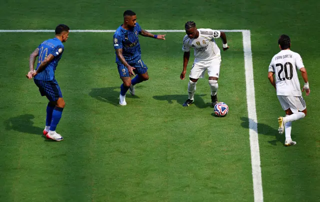 Vinicius Junior #7 of Real Madrid C.F. controls the ball